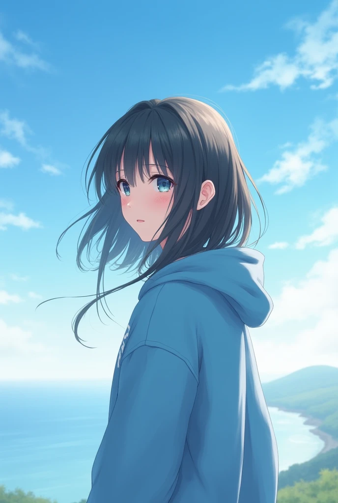 A girl wearing a blue hoodie with a beautiful sky