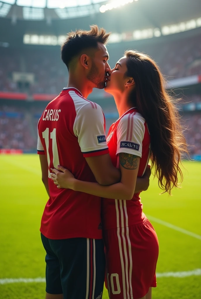 A soccer player named Yan Carlos with the number 11 on his back kissing his beautiful girlfriend 
