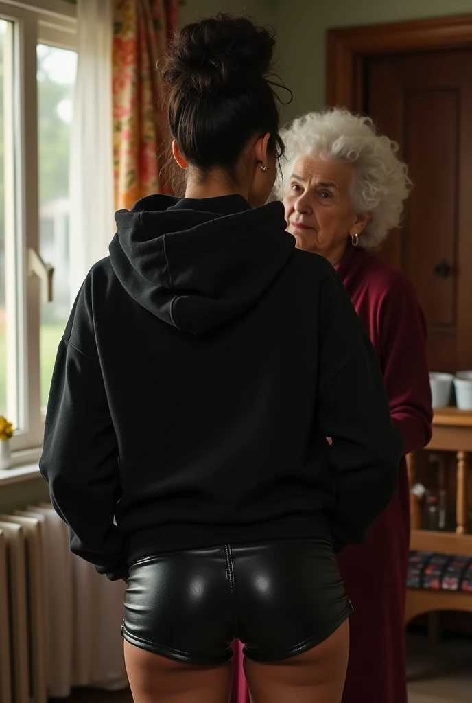 black woman hair in a bun black hoodie black leather short shorts being fucked in the ass by a old grandma in a dress