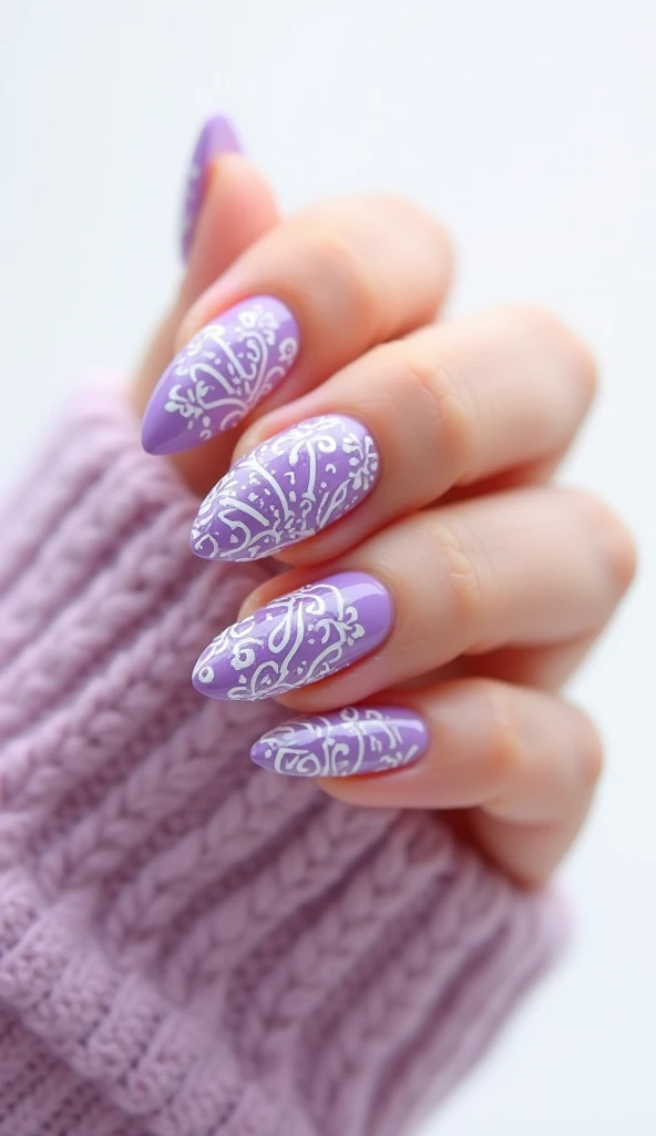 Create a Talavera style nail design in lilac colors in an almond shape with a white background