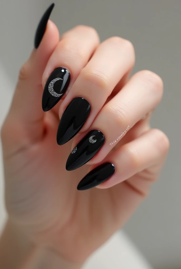 Black almond soft gel nails with simple drawings of a moon