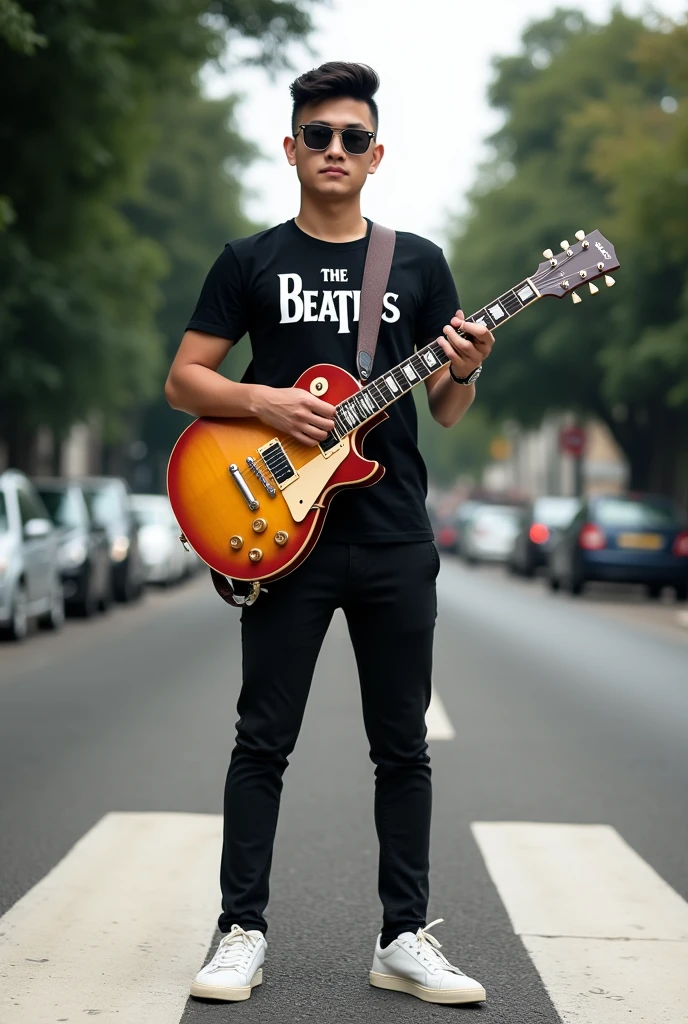 an Indonesian young man posing as a model. sunglasses with electric guitar. This is a 1959 Gibson Les Paul. The guy got a fade treatment at the hairdresser so his hair is done very well. . He dressed classy but not too much.. A black Beatles band t-shirt with fitted trousers. white sneakers. at the abbey road zebra crossing.