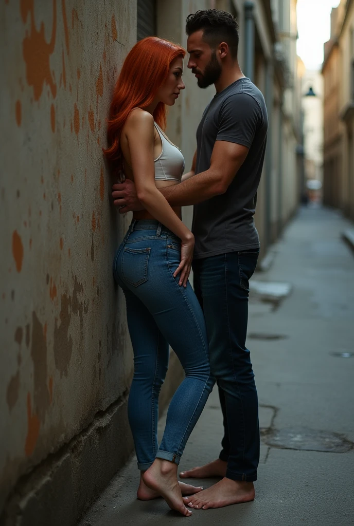 Redhead on the street facing the wall, barefoot, in jeans, Sexy skinny woman. Man hugging woman from behind.