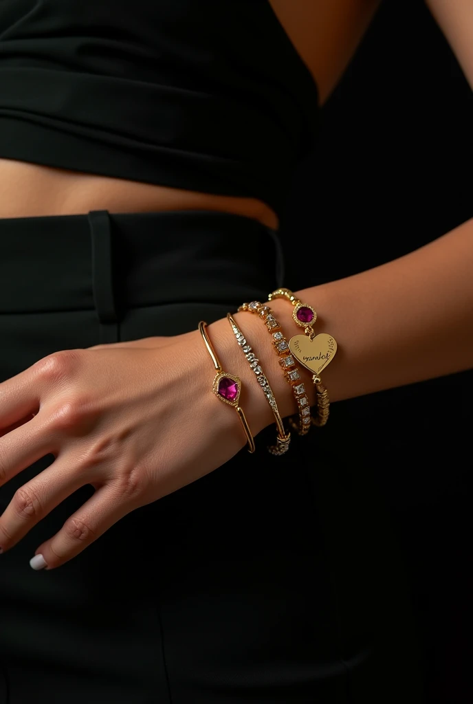 A high-resolution photograph of a woman's wrist adorned with three exquisite gold bracelets. The "Yarazet" bracelet, inscribed with cursive script, brings a touch of love to the ensemble. The second bracelet, adorned with a mesmerizing heart-shaped ruby that sparkles as it catches the light, adds depth to the composition. The "31/12/1999" bracelet, boldly inscribed and personal, offers a unique touch. The velvety black backdrop accentuates the rich metallic sheen of the jewelry, creating a captivating and extravagant scene that exudes grace and refinement.