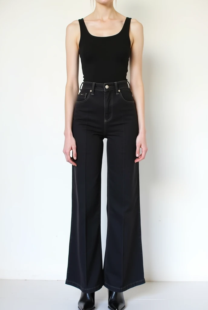 clothes, black top and wide high-waisted jeans on a white background stands straight and has trained hands, without a model and everything is clearly visible