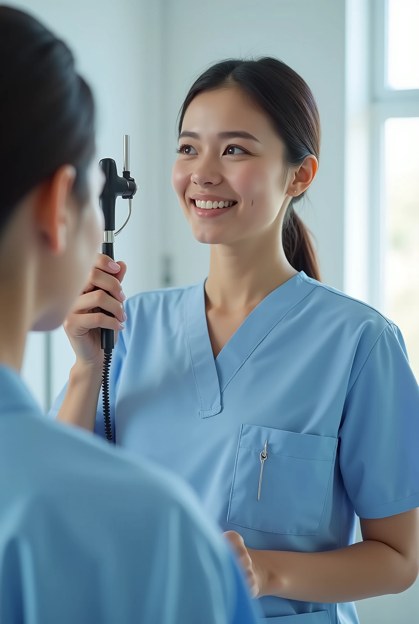 Nurse in light blue uniform with otoscope