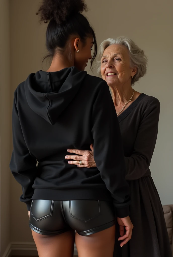 black woman hair in a bun black hoodie black leather short shorts being fucked in the ass by a old grandma in a dress