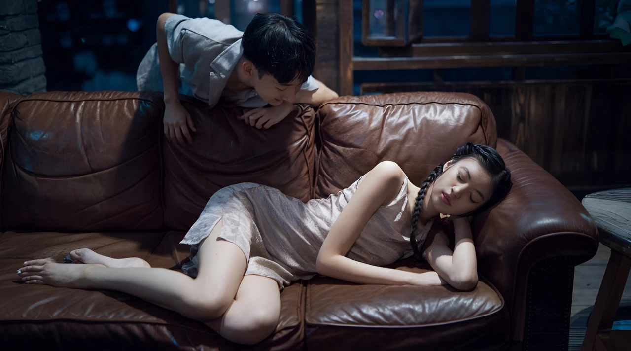 Young man, dark-haired, shining blue eyes. only in white underwear. Sitting with legs apart on a chair, with open mouth salivating, in a hall lit by a lilac light. With clothes scattered on the floor