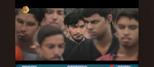 a fan with a straight face and fans in the background, cinematic, high definition