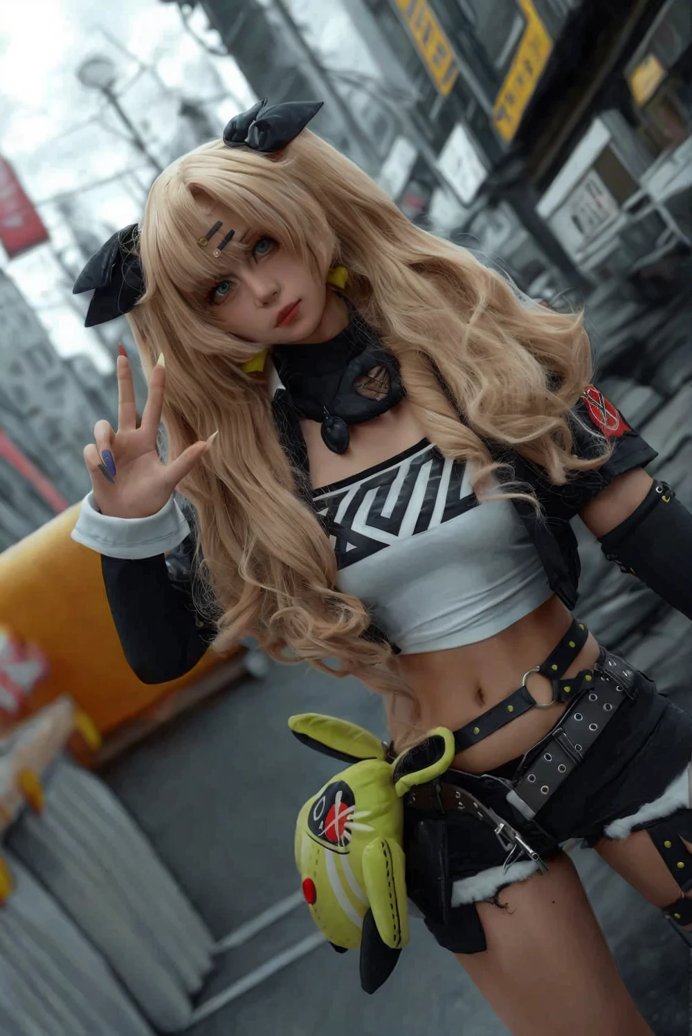 Ganguro is one of the most extreme substyles of gyaru. It features the classic gyaru silhouette but adds in extreme tanning, bright white makeup around the eyes, light-colored lipstick, and bright, often neon, colored clothing. Extremely blond died hair is also popular in the style. The substyle also often exaggerates classic gyaru features, such as extremely long nails decorated with many charms.