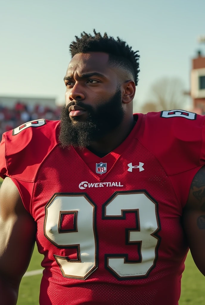 Complete red and black football team uniform with white hawk logo