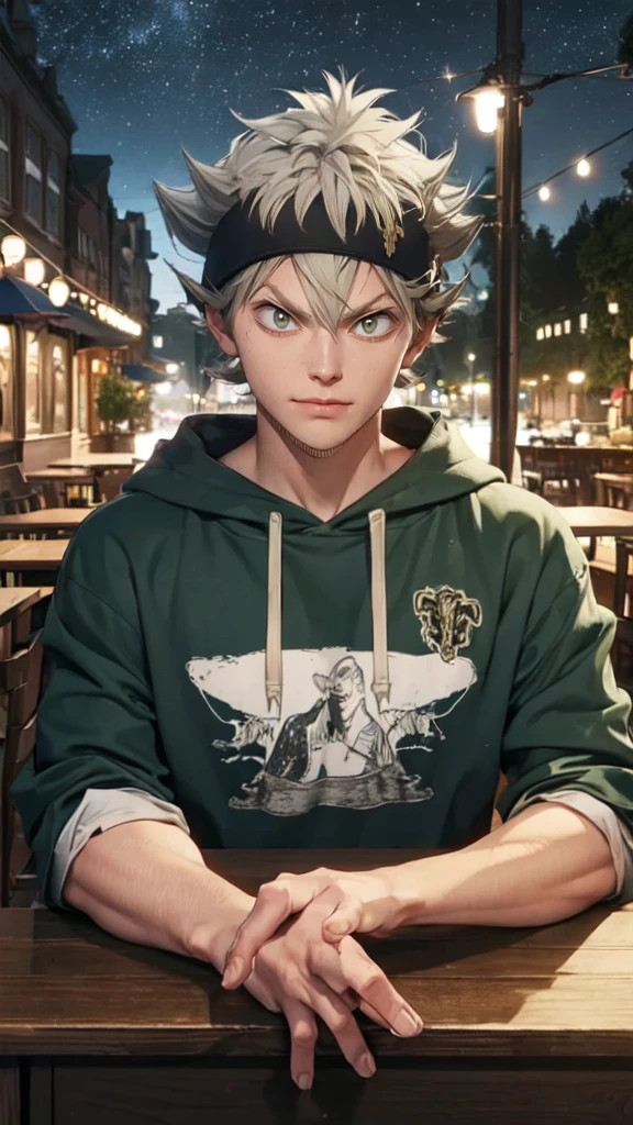 Asta, wearing a green hoodie, gray hair, is in a cafe at night