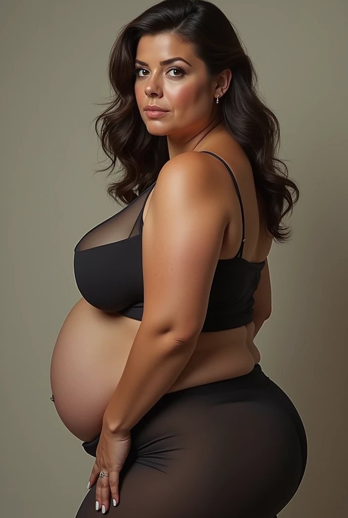 A pregnant Latina with big boobs and a big belly with a fat camel toe