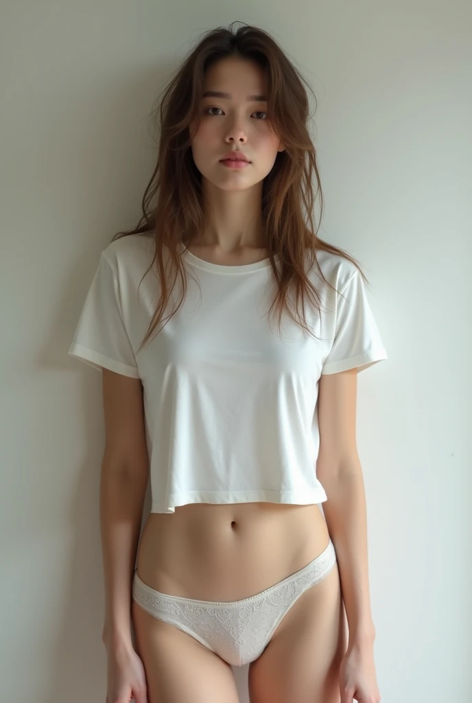 Girl sitting on a bed with only a garment or clothing that is a T-shirt that covers her breasts and crotch