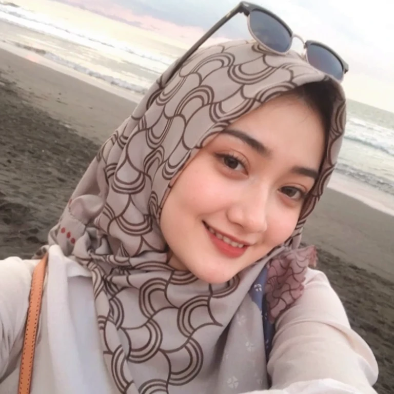 RAW photo of a 24 year old girl wearing hijab,((smile)), satin abaya sexy sea foam , satin, hijab face portrait,((tp background)), 8k uhd, dslr, soft lighting, high quality, film grain, Fujifilm XT3, covered dress, patterned dress, gigantic breasts:1.5 , ((HD))