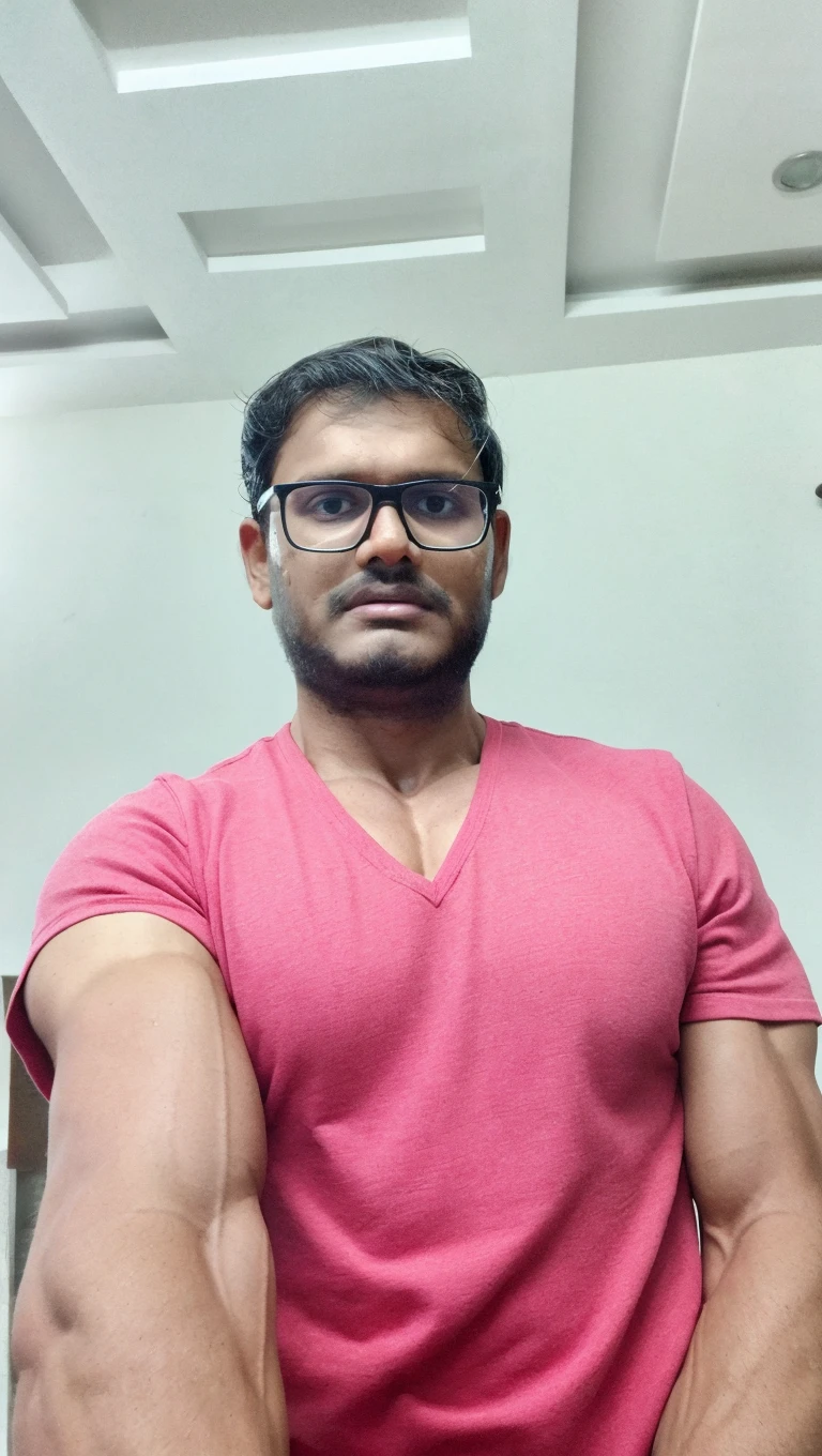A handsome man with a six-pack body wears glasses with a visible penis and ejaculates sperm in his hand