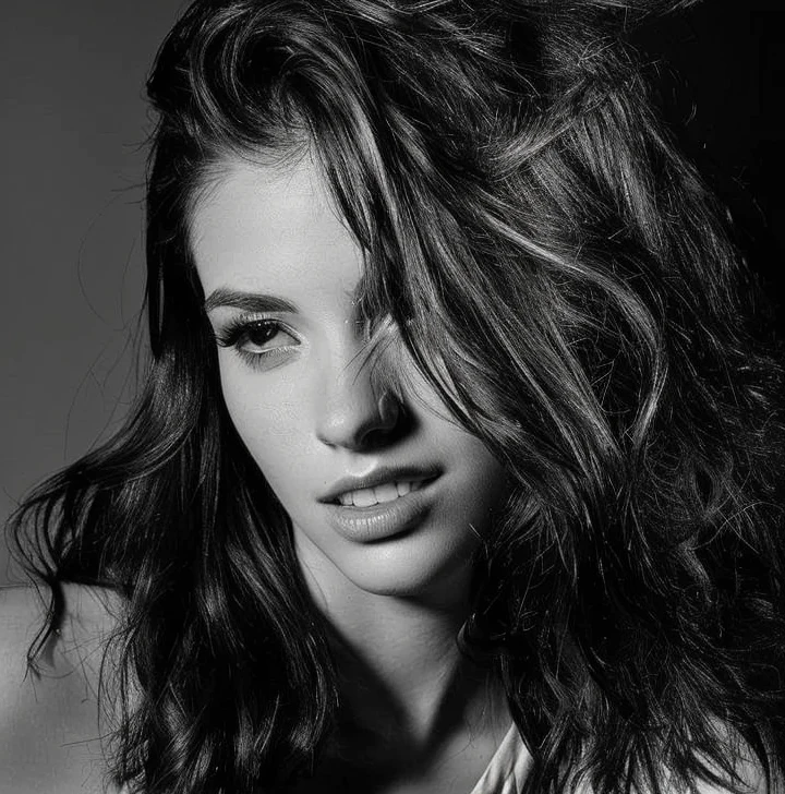 Masterpiece, transform this portrait of a young woman with long, wavy hair., make these image a color flsShe appears to be in her late twenties or early thirties and has a serious expression on her face. Her hair is styled in loose waves and falls over her shoulders. She is wearing a sleeveless top with a striped pattern. The background is dark and out of focus, making the woman the focal point of the image. The lighting is dramatic and dramatic, highlighting her features