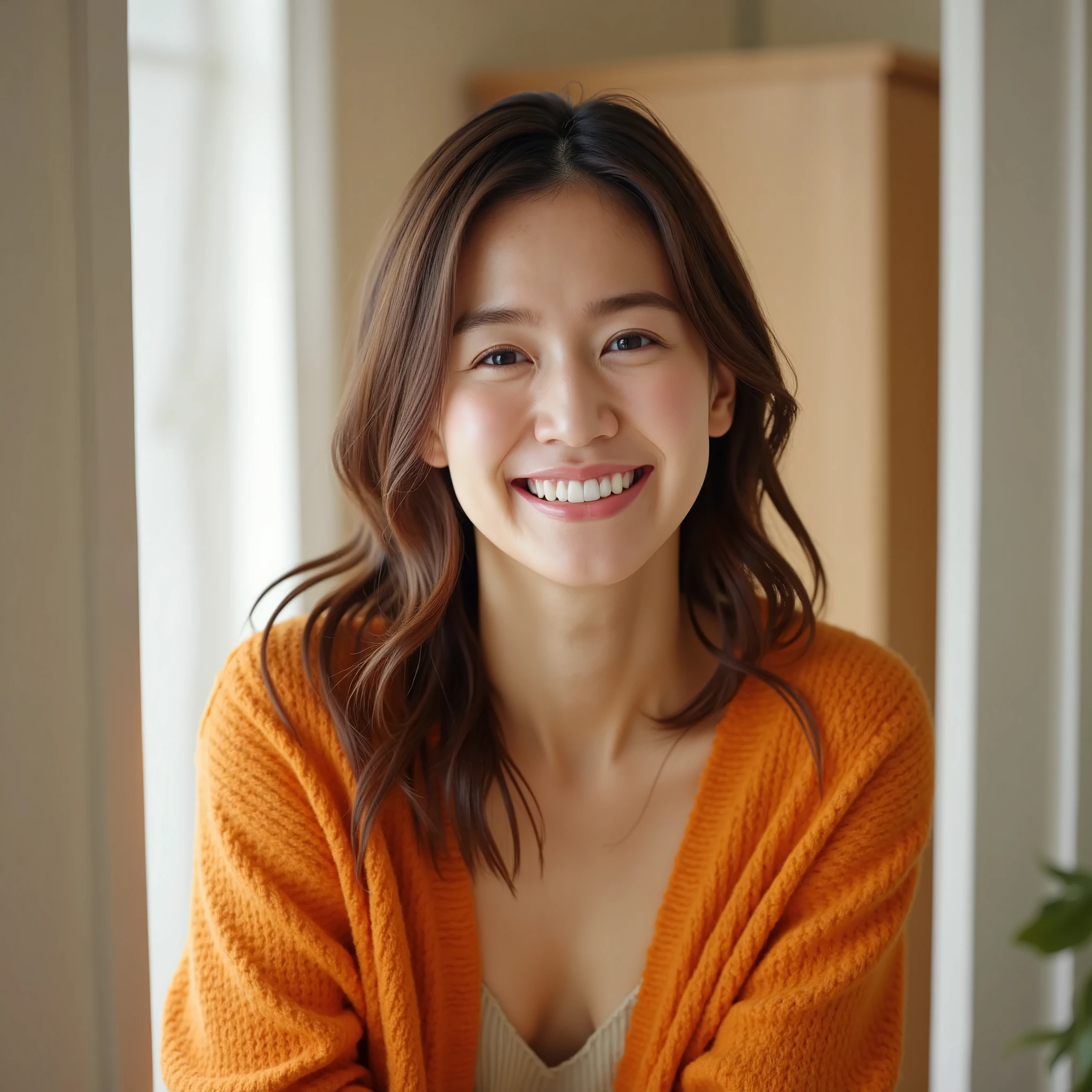 Asian woman, standing indoors, smiling warmly, wearing an orange cardigan, leaning slightly through a doorway, soft natural lighting, simple modern home interior, cheerful and relaxed expression, casual and friendly atmosphere