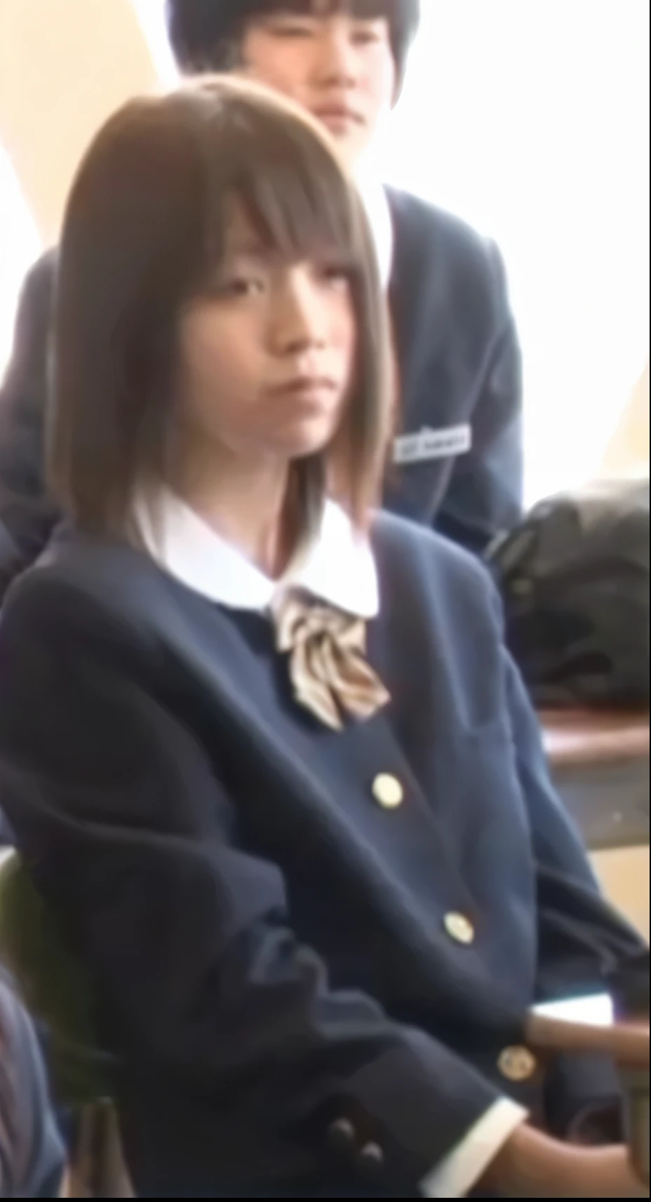In the classroom of  the school、A female teacher sitting on a chair、I had a female student face down on my lap.、spanking
