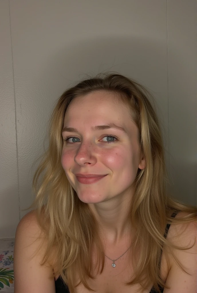 beautiful blonde model, perfect body, perfect face, freckles only on face, dirty blonde hair, hazel eyes, busty body, thick body, wearing black lingare, glasses, sat on her bed, smile, perfect smile, hair in a messy bun, glasses, full body photo