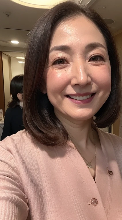 (a masterpiece portrait of a woman with ultra detailed features, in 8K resolution, with crisp quality and vibrant colors)、from above, upper body, looking up、(62-year-old female president :1.4)、 greets you at the entrance of the Luxury Hotel room、round face、Grinning face、smile、((( elegant medium hair、))),  Beautiful Mature Women , ( realistic facial wrinkles:1.4、 wrinkles on the outer corner of the eyes :1.2、Double eyelids、Tear bags、 nasolabial fold :1.4),  perfect business makeup 、 beautifully written slightly thin eyebrows、 shiny dark pink lips 、Very thick lips、Beautiful eyes、 slightly chubby :0.2，Beautiful eagle nose 、((( beautiful shiny skin without a single blemish )))、Oily skin、 wear a business suit 、Huge breasts、J-cup以上あるHuge breasts、Extremely droopy breasts、肩がこりそうなLarge Breasts、Huge breasts、 detailed background、 WATCH VIEWERS :1.8、 gray hair mixed with pubic hair , Large Breasts、 chromo white skin close-up photo focusing on the upper body、Not a long face :1.4、 not a horse face :1.4