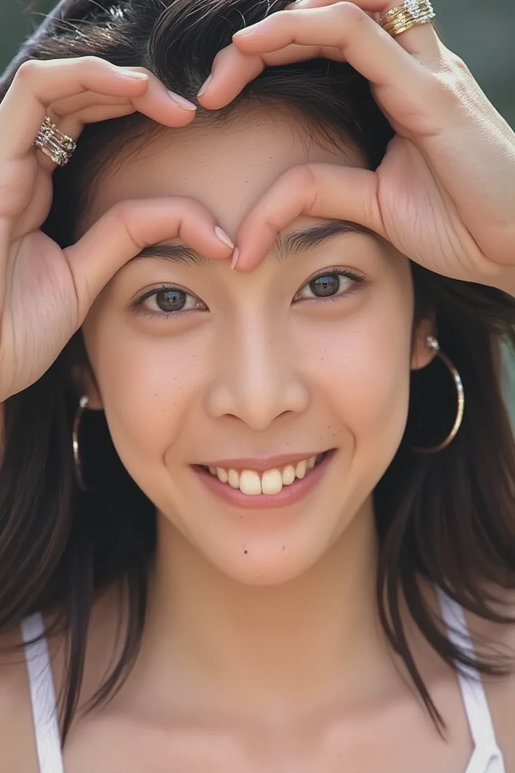 She is posing with both hands firmly in the shape of a big heart and holding it in front of her chest with a smile:1.67, (masterpiece), (Best Quality), ( very detailed ), (One Girl), (bikini:1.2),  in the center standing,  fashion model,  (Ultra Precise Human Body Structure   ,   best quality 、RAW Photos、8k、32K、masterpiece、Realistic、Realistic:1.37)、Cute Japanese women images、Photographed in natural light、 1 girl、Photo Mapping、   Physically Based Rendering   、Excellent image quality、  Kampala 、1080P、(Beautiful Face)、(Detailed description of the face)、((Detailed CG)、Rich details、(Detailed eyes)、 Delicate clavicle、 very realistic and detailed young woman 、  Beautiful skin、   soft light is reflected in the high part of the cheek、   small pores and hair follicles  、   even the smallest blood vessels are visible、The skin is smooth、natural flushing of cheeks 、Healthy glow、  The eyes are large and clear blue、  The iris has fine patterning、  with light reflecting and shining in the eyes 、  There is a slight shadow under the eye、  with long, naturally curly lashes 、 her lips are soft pink 、  smooth texture and natural shine 、   background is pale black and white gradation  、The focus is completely on the face 、Realistic shadows and textures、 photographic depiction 
