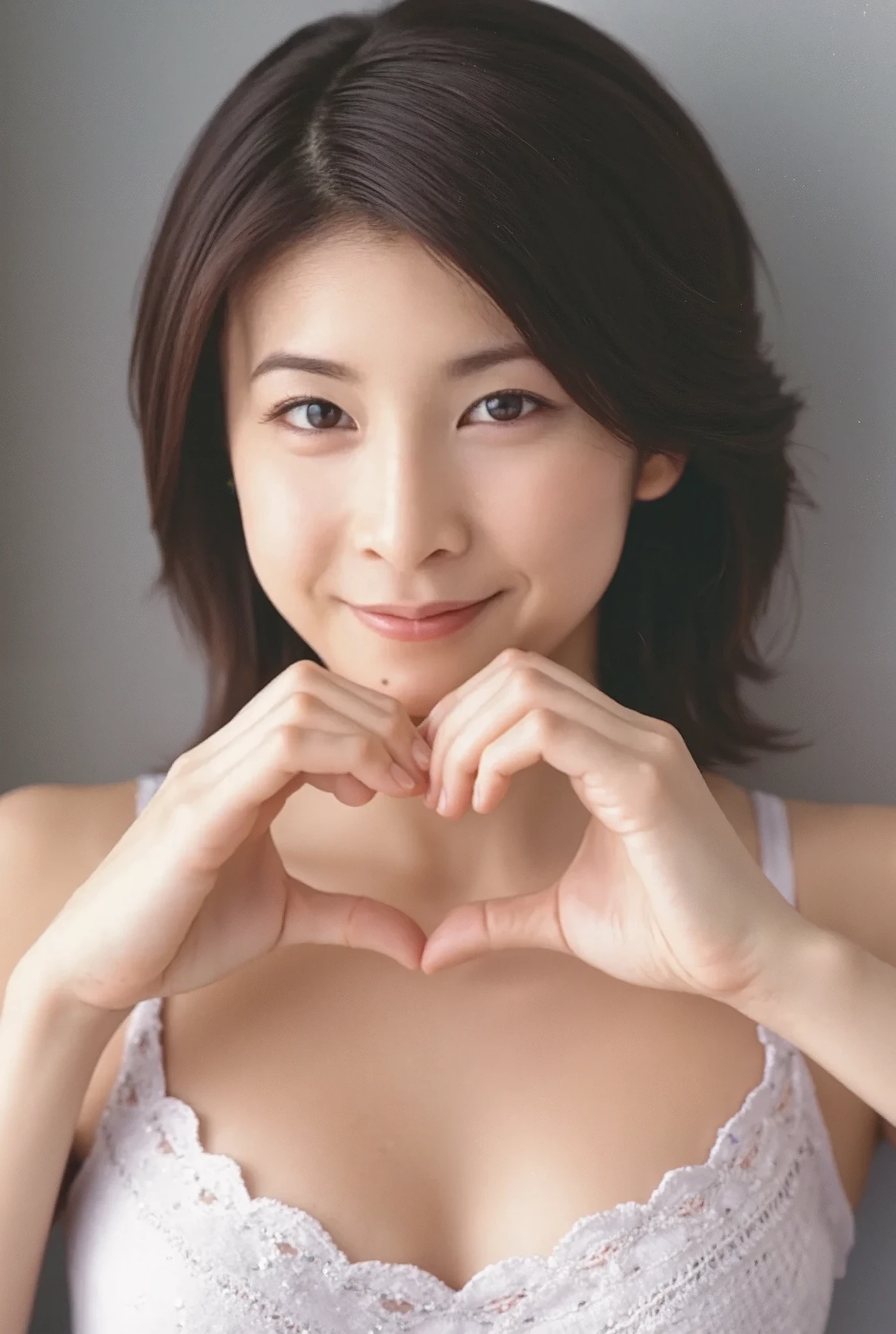 She is in a pose wearing a sexy camisole, making a firm big heart shape with both hands, and holding it in front of her chest, Cute smile up、Monotone background

