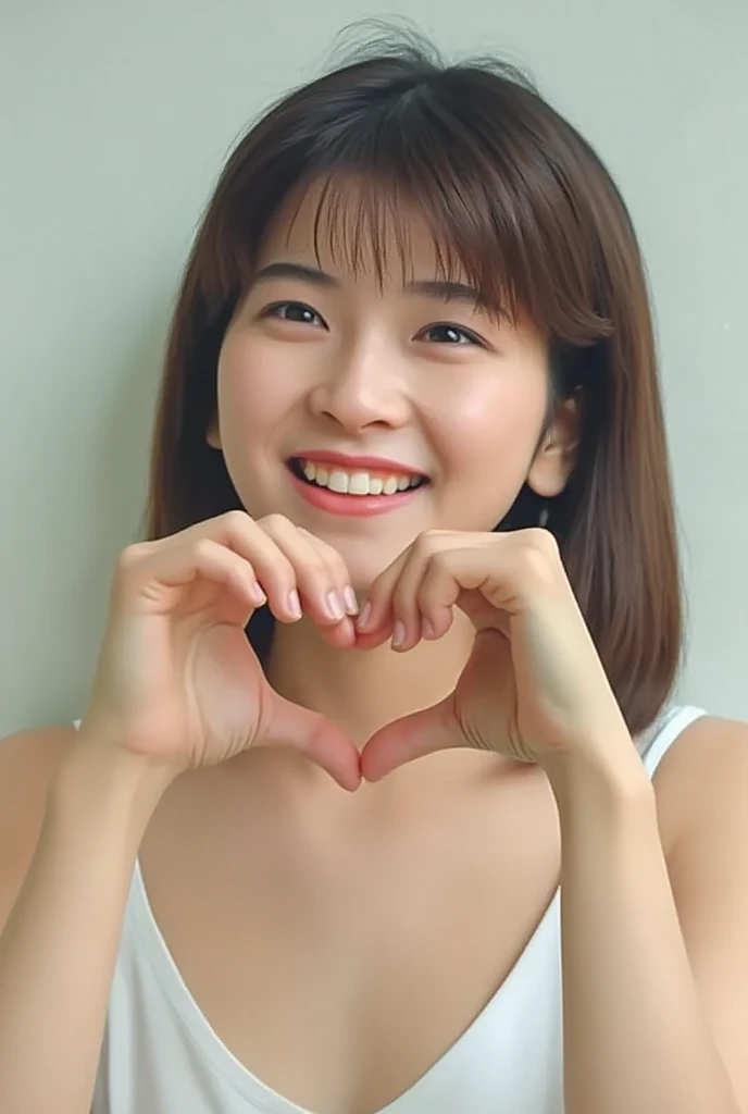 She is in a pose wearing a camisole, making a firm big heart shape with both hands, and holding it in front of her chest, View above collarbone、Cute smile up、Monotone background

