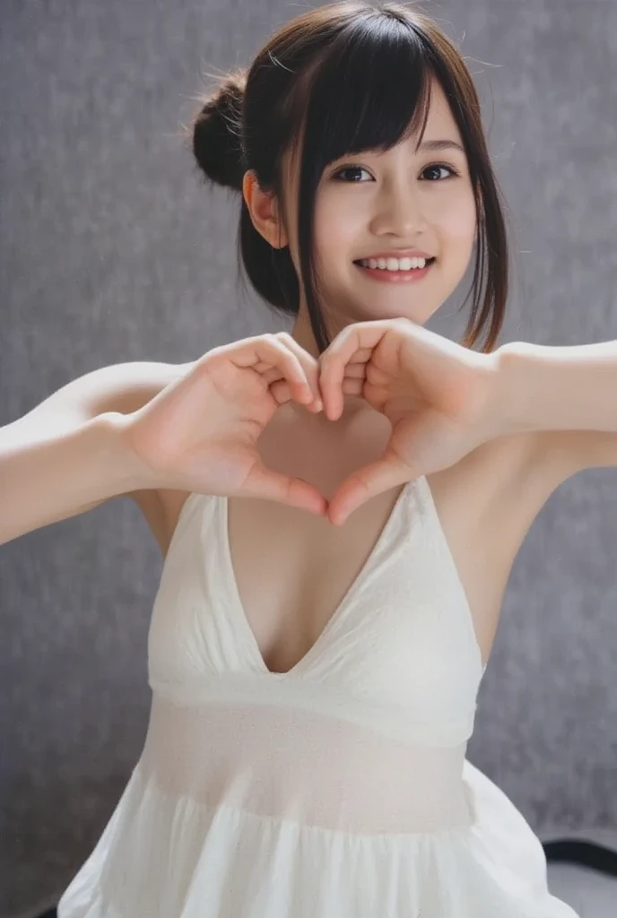 She is in a pose wearing a camisole, making a firm big heart shape with both hands, and holding it in front of her chest, View above collarbone、Throat up for a cute smile、Monotone background

