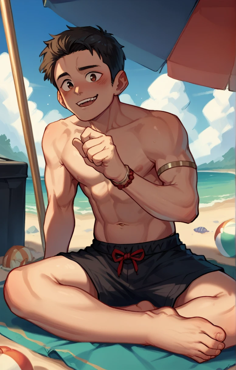 Cute Asian boy on the beach sitting on the sand in black swimming trunks 