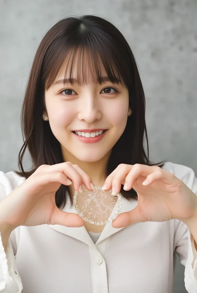 Only one woman with a cute smile is in a pose wearing off-shoulder pajamas, making a firm big heart shape with both hands, and holding them in front of her chest, View above collarbone、The background is a monotone 

