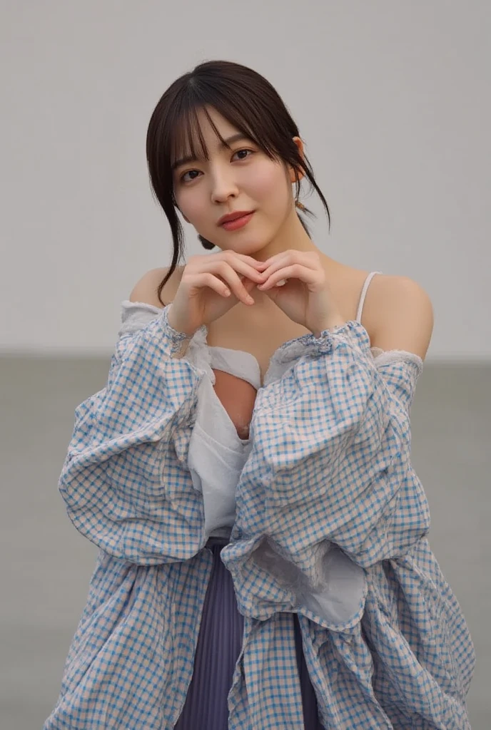 Only one woman with a cute smile is in a pose wearing off-shoulder pajamas, making a firm big heart shape with both hands, and holding them in front of her chest, View above collarbone、The background is a monotone 

