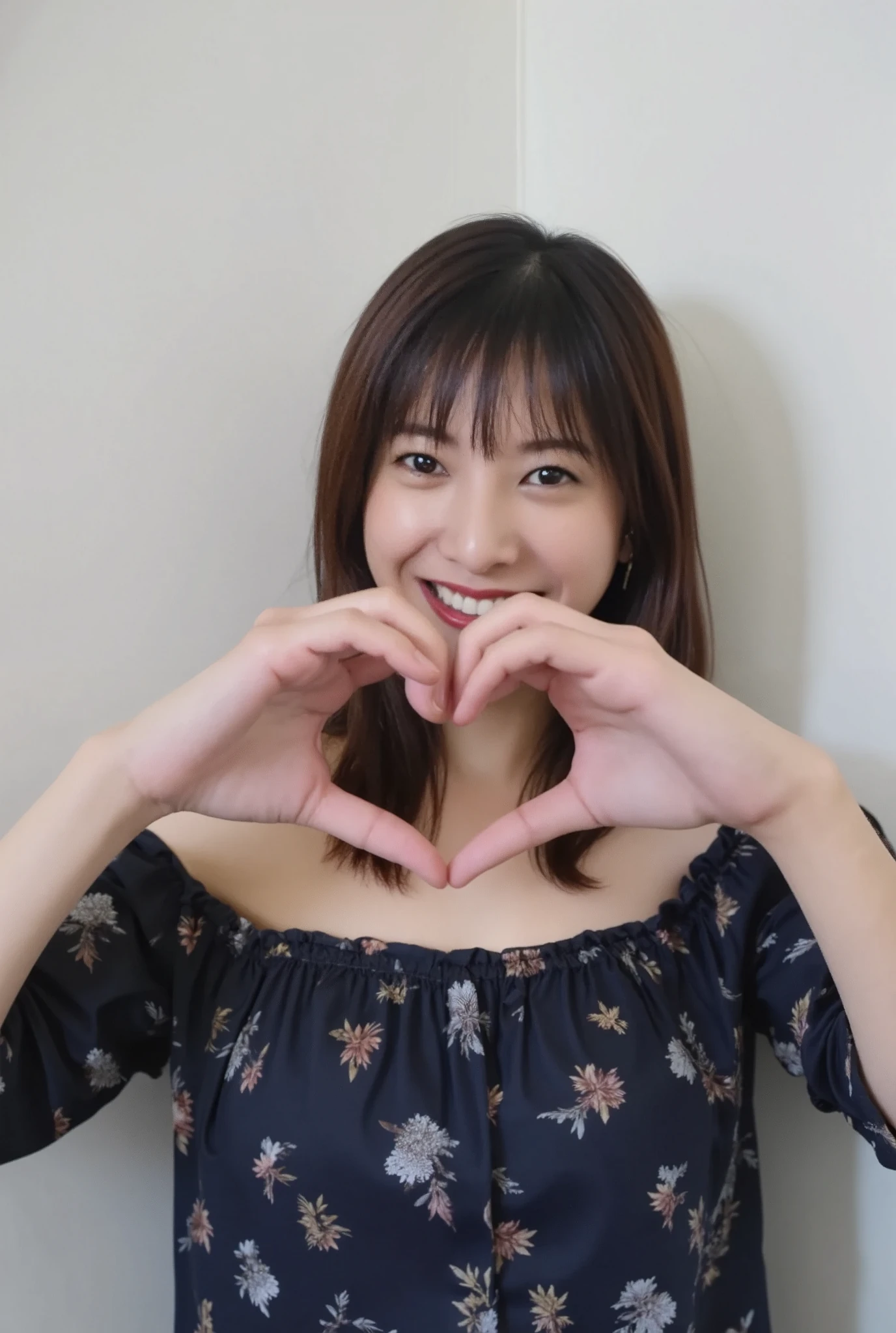 Only one woman with a cute smile is in a pose wearing off-shoulder pajamas, making a firm big heart shape with both hands, and holding them in front of her chest, View above collarbone、The background is a monotone 

