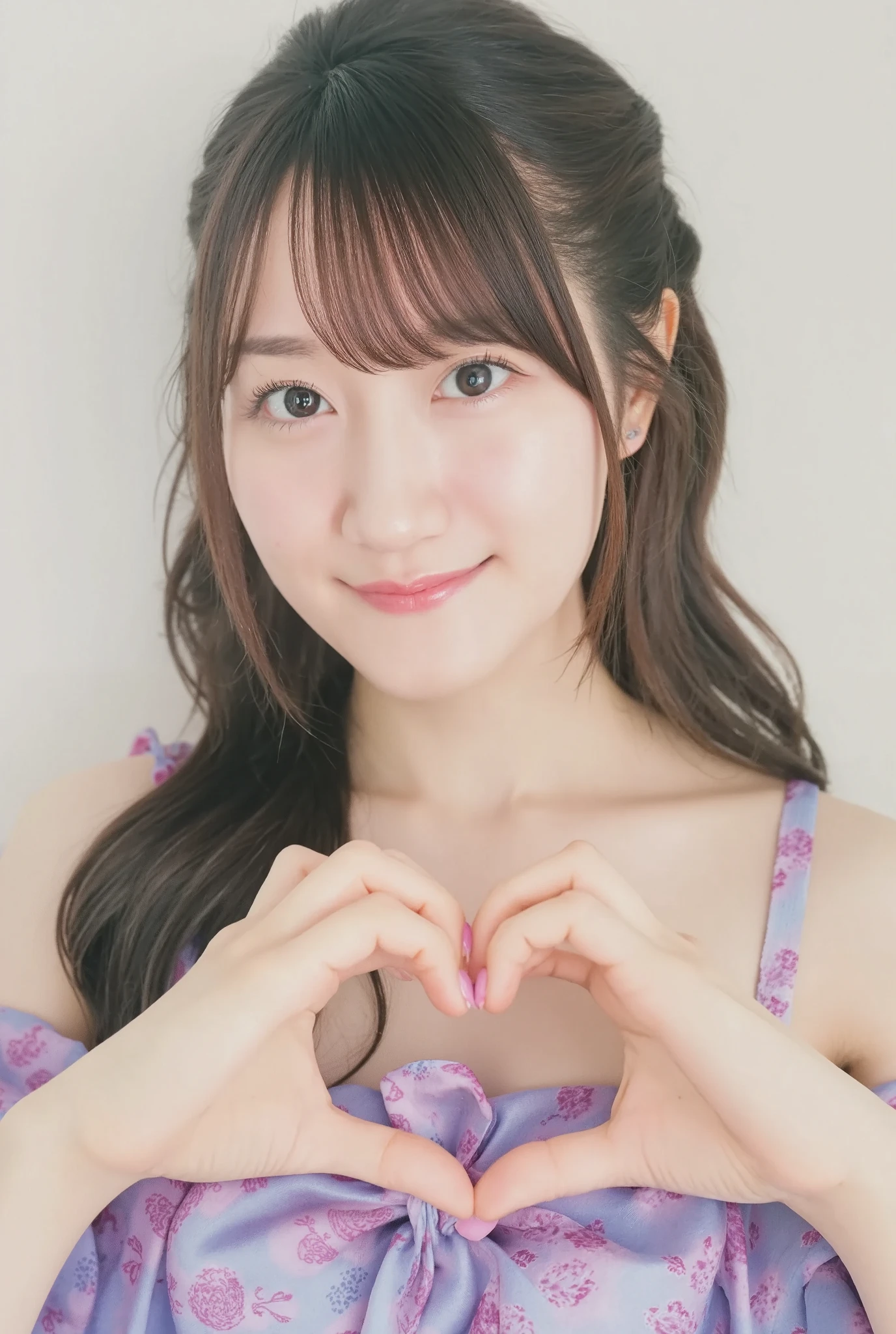 Only one woman with a cute smile is in a pose wearing off-shoulder pajamas, making a firm big heart shape with both hands, and holding them in front of her chest, View above collarbone、The background is a monotone 

