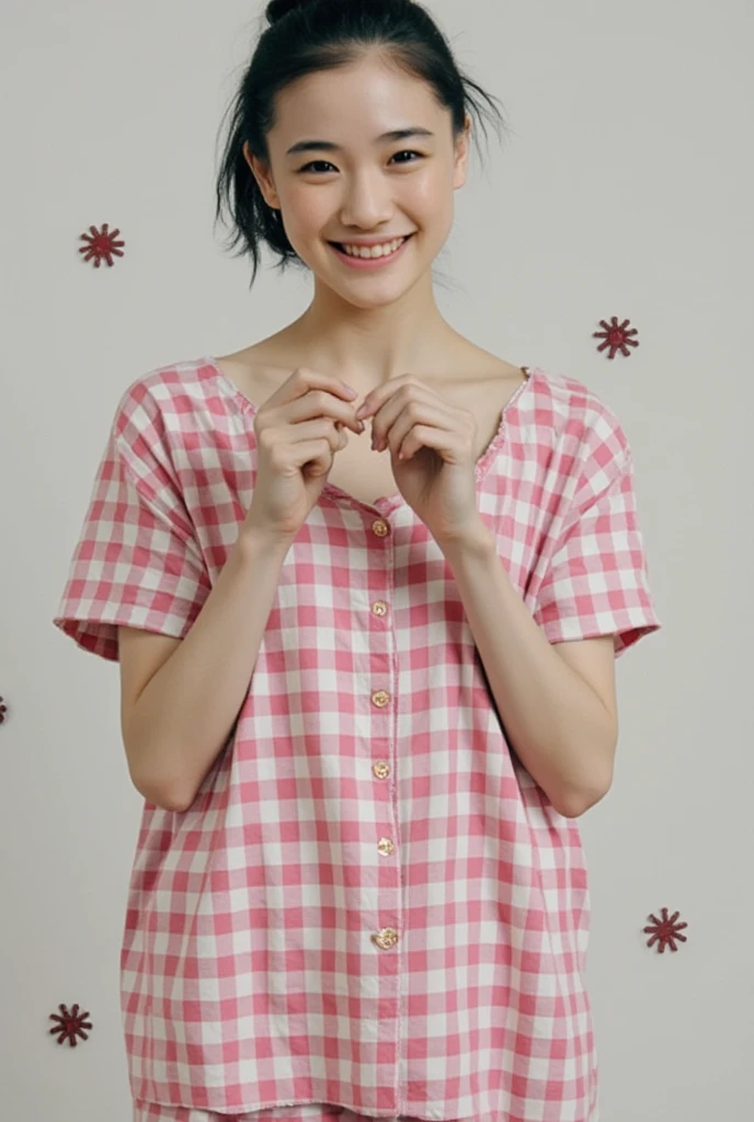 Only one woman with a cute smile is in a pose wearing off-shoulder pajamas, making a firm big heart shape with both hands, and holding them in front of her chest, View above collarbone、The background is a monotone 

