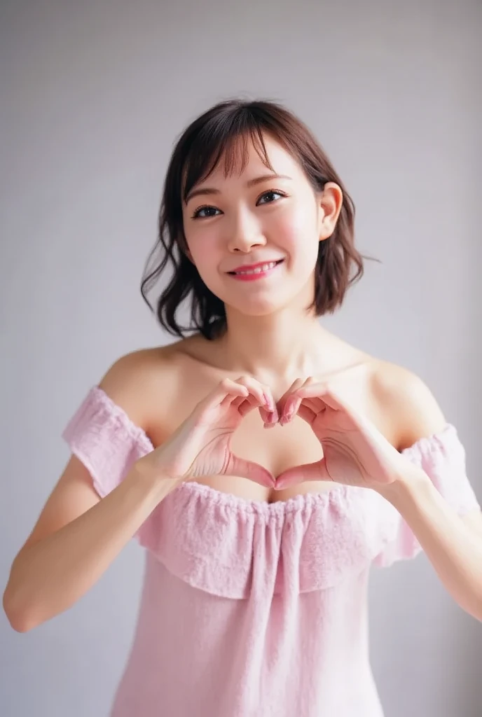 Only one woman with a cute smile is in a pose wearing off-shoulder pajamas, making a firm big heart shape with both hands, and holding them in front of her chest, View above collarbone、The background is a monotone 

