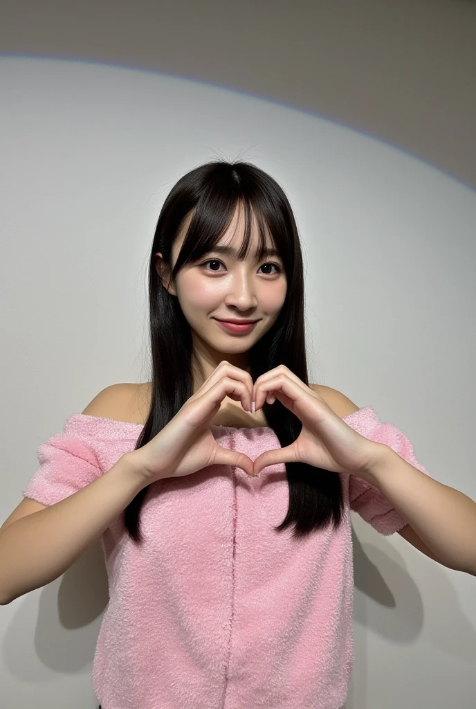 Only one woman with a cute smile wears cute, fluffy off-shoulder pajamas, makes a big heart shape with both hands, and poses them in front of her chest, View above collarbone、The background is a monotone 

