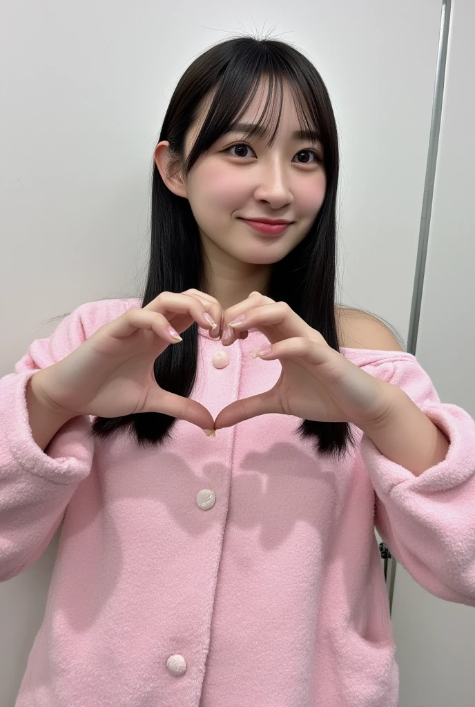 Only one woman with a cute smile wears cute, fluffy off-shoulder pajamas, makes a big heart shape with both hands, and poses them in front of her chest, View above collarbone、The background is a monotone 

