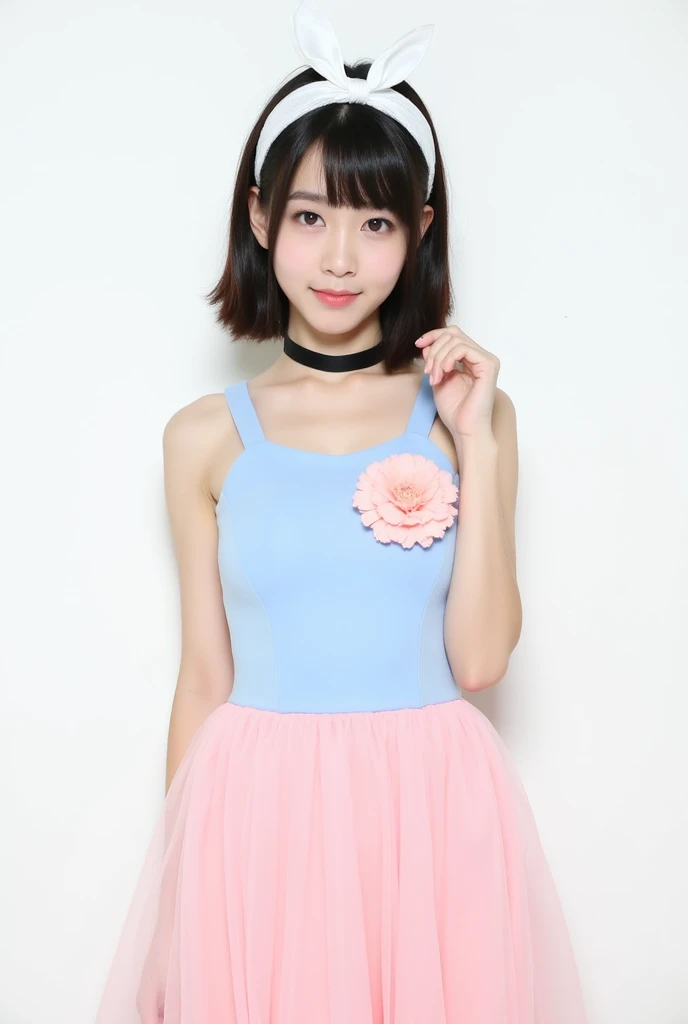 a young woman stands against a stark white backdrop. She is dressed in a light blue sleeveless dress with a pink skirt. The skirt is adorned with a light pink flower, adding a touch of color to the scene. The woman's hair is styled in a sleek bob, with a white bow at the top of her head. She has a black choker around her neck. Her hair is pulled back in a ponytail, and she is wearing a white headband.