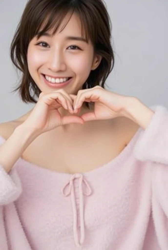 Only one woman with a cute smile wears cute, fluffy off-shoulder pajamas, makes a big heart shape with both hands, and poses them in front of her chest, View above collarbone、The background is a monotone 

