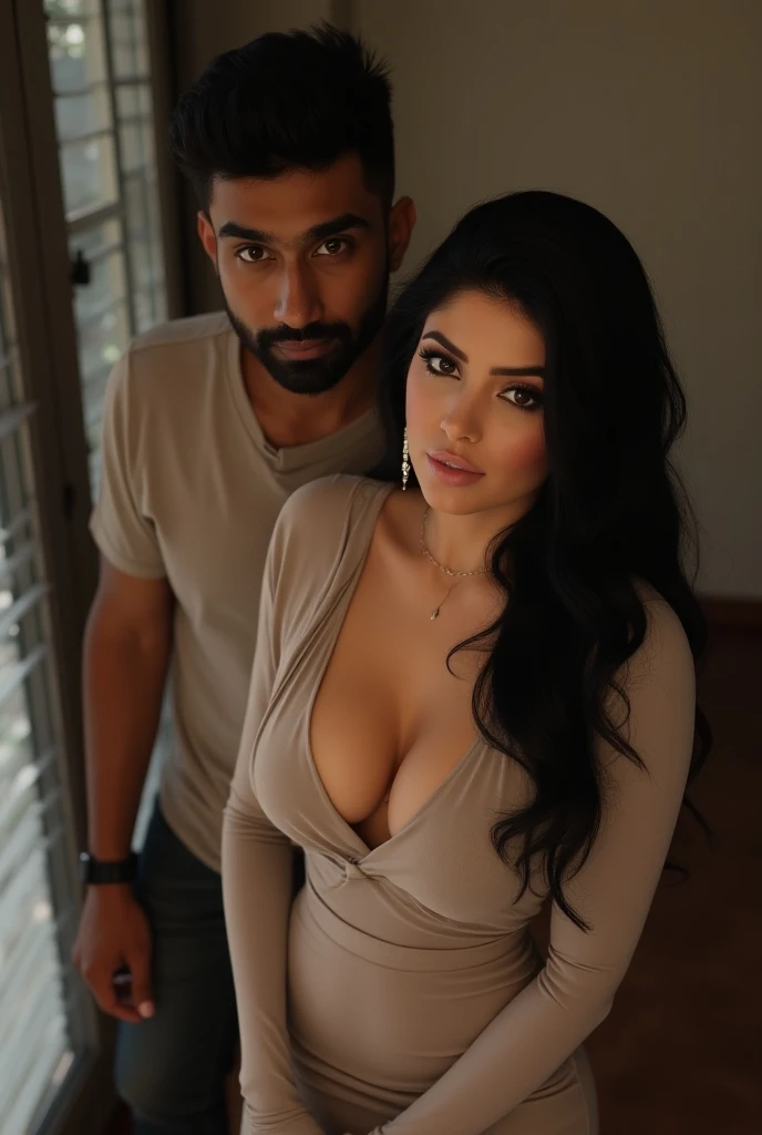 Create an ultra-realistic image of a modern, attractive female influencer of Indian descent, aged between 27 to 30. She should have a warm and inviting smile, expressive almond-shaped eyes with a subtle shimmer, and clear, glowing skin with a medium brown complexion. Her features should be well-defined, with high cheekbones and a sharp jawline. Her hair should be long, thick, and wavy, styled in loose waves with a natural shine.

She is wearing a playful pink skirt with layers of soft tulle but is otherwise topless, she have big boob, very large ,  are loose, creating an elegant and slightly provocative look. She is sitting on the edge of the plush king-sized bed in the luxurious hotel suite, playfully leaning against her Indian boyfriend, who has a solid, muscular build and a six-pack, with a smooth, clean-shaven face. He is wearing jeans without a shirt, showcasing his well-defined physique.

They are both looking at each other with affectionate smiles. The background features an elegant chandelier and a cityscape view through floor-to-ceiling windows, with realistic lighting and details that highlight the opulence of the setting. The focus should be on capturing the relaxed and intimate moment of the couple in a natural and genuine pose, emphasizing their connection and the luxurious ambiance of the suite.