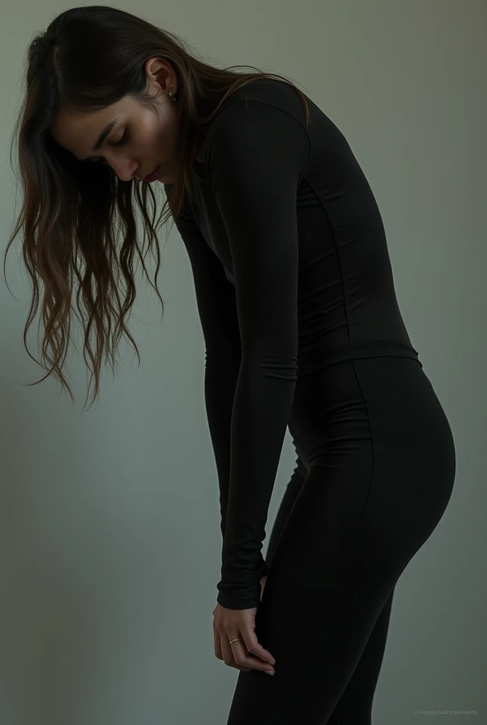 2 British girl wearing black leggings and black top doing situps on grass
