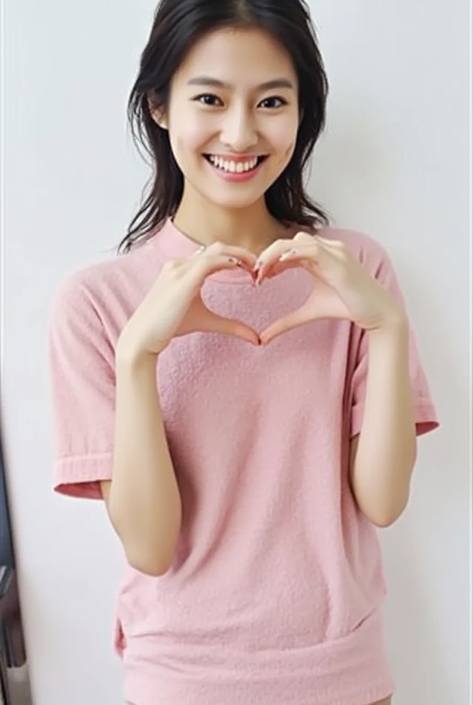 Only one woman with a cute smile wears cute, fluffy off-shoulder pajamas, makes a big heart shape with both hands, and poses them in front of her chest, View above collarbone、The background is a monotone 

