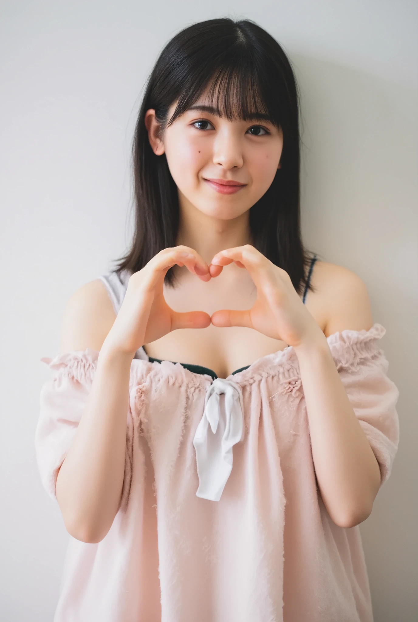 Only one woman with a cute smile wears cute, fluffy off-shoulder pajamas, makes a big heart shape with both hands, and poses them in front of her chest, View above collarbone、The background is a monotone 

