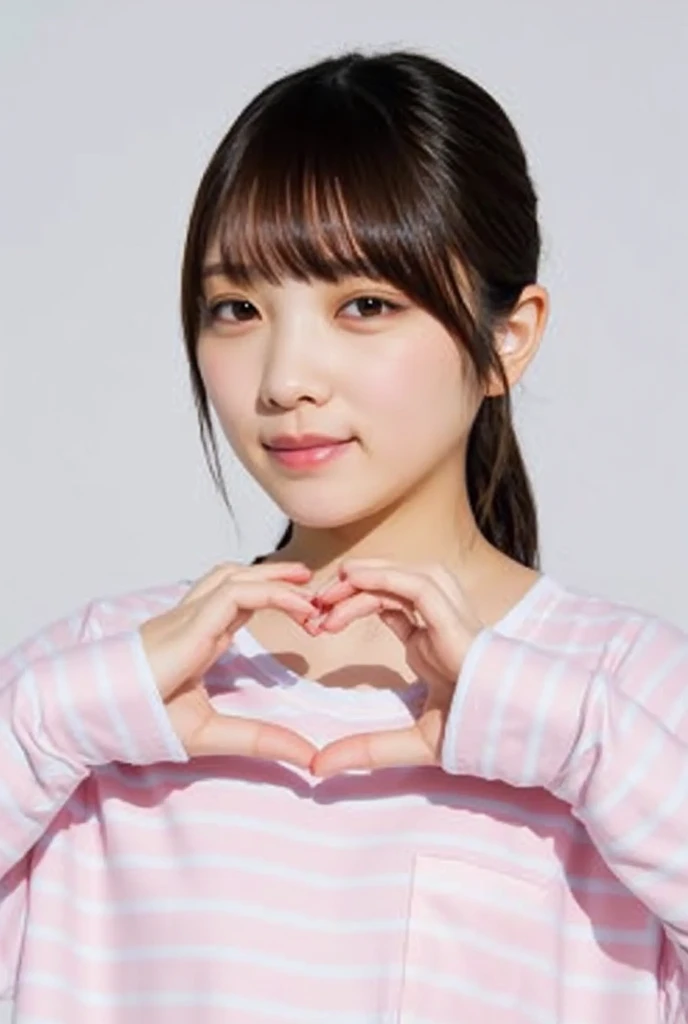 Only one woman with a cute smile wears cute, fluffy off-shoulder pajamas, makes a big heart shape with both hands, and poses them in front of her chest, View above collarbone、The background is a monotone 、
