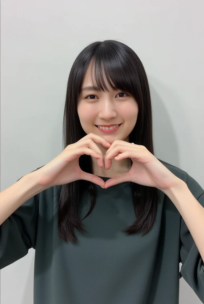 Only one woman with a cute smile wears cute, fluffy off-shoulder pajamas, makes a big heart shape with both hands, and poses them in front of her chest, View above collarbone、The background is a monotone 、
