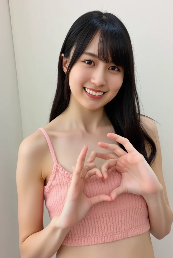 Only one woman with a cute smile wears cute, fluffy off-shoulder pajamas, makes a big heart shape with both hands, and poses them in front of her chest, View above collarbone、The background is a monotone 、
