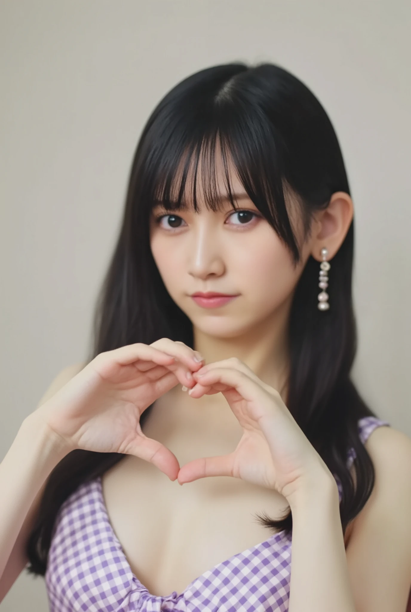 Only one woman with a cute smile is in a pose wearing a bikini, making a firm big heart shape with both hands, and holding it in front of her chest, View above collarbone、The background is a monotone 、
