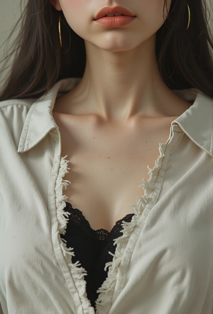 A close-up of a fashionable outfit with a tear across the chest area. The fabric is slightly frayed at the edges, giving it a natural, worn-out look. The background is neutral, and the focus is on the texture and details of the fabric tear, highlighting the design and material