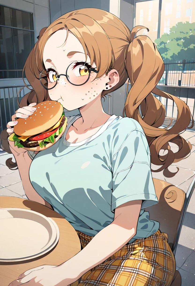 1girl, solo, masterpiece, best quality, (anime art style:1.0), curly flipped brown hair, band aid on her cheek, freckles, oversized t-shirt, eating a burger, sitting at a table, apartment background, white slippers, round breasts, plaid jogging pants, yellow eyes, twin tail hair style, thin round glasses, stud earrings, fair skin